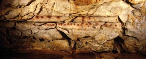 Discos rojos Cueva El Castillo